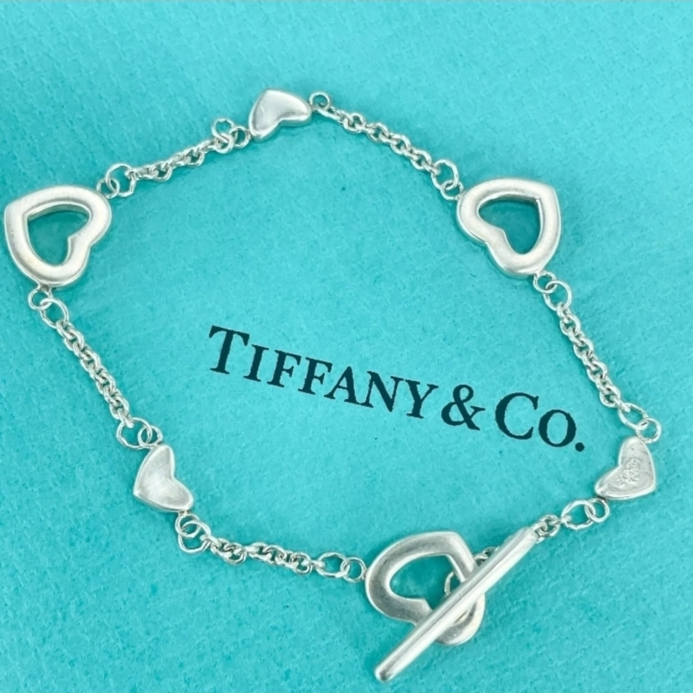 Tiffany & Co. Silver Bracelet with Heart Charms and Toggle Clasp